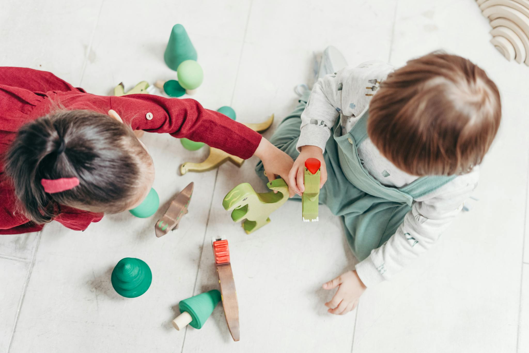 Children Playing With Animal Toys