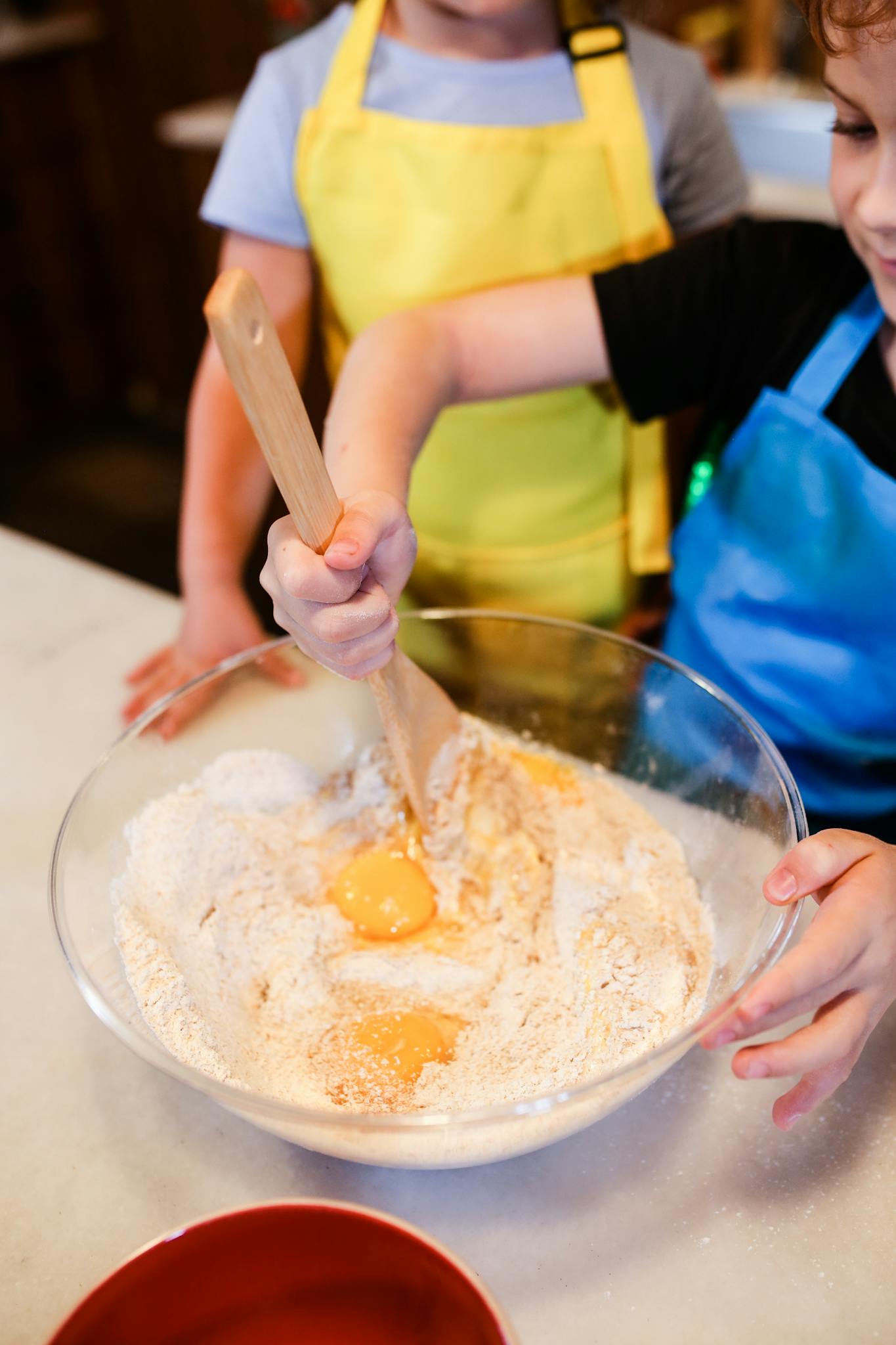 a boy making a dough